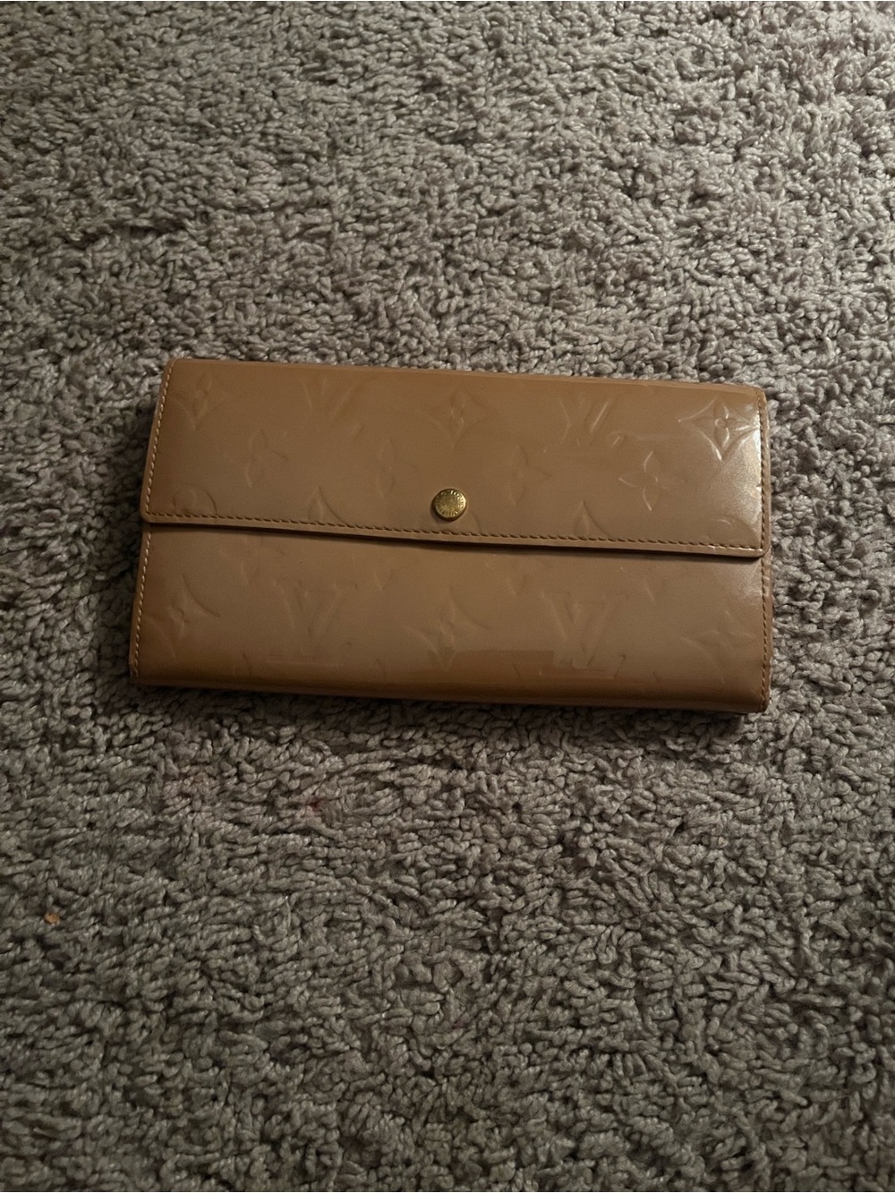 Louis Vuitton sleek leather tan wallet